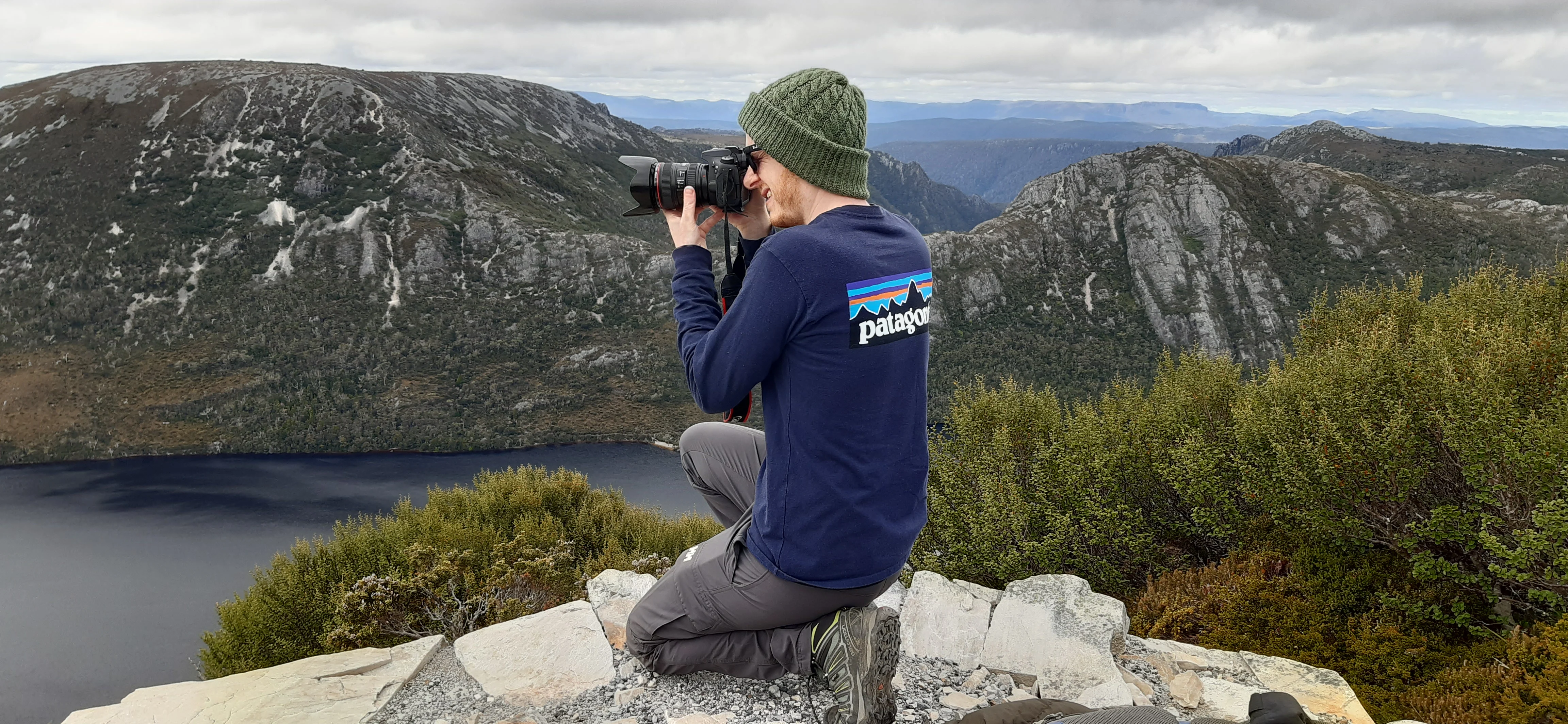 Antoine Bellavance photographing a mountain landscape.